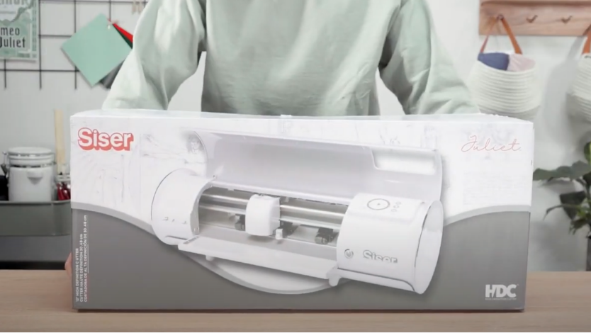 Man at desk using printer